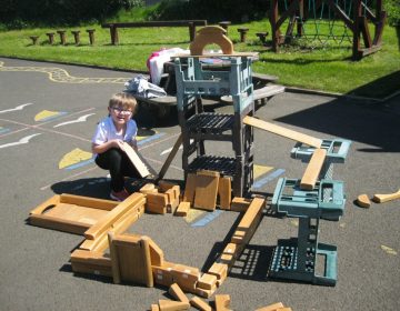 Harry Used Wooden Blocks And Crates To Create A Castle