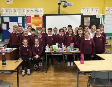 P6/7 with the items they collected for the Road of Hope Appeal