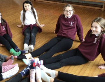 Primary Seven show off their odd socks for Friendship Week!
