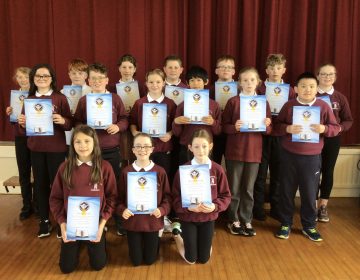 Primary Seven receive their Confirmation certificates.